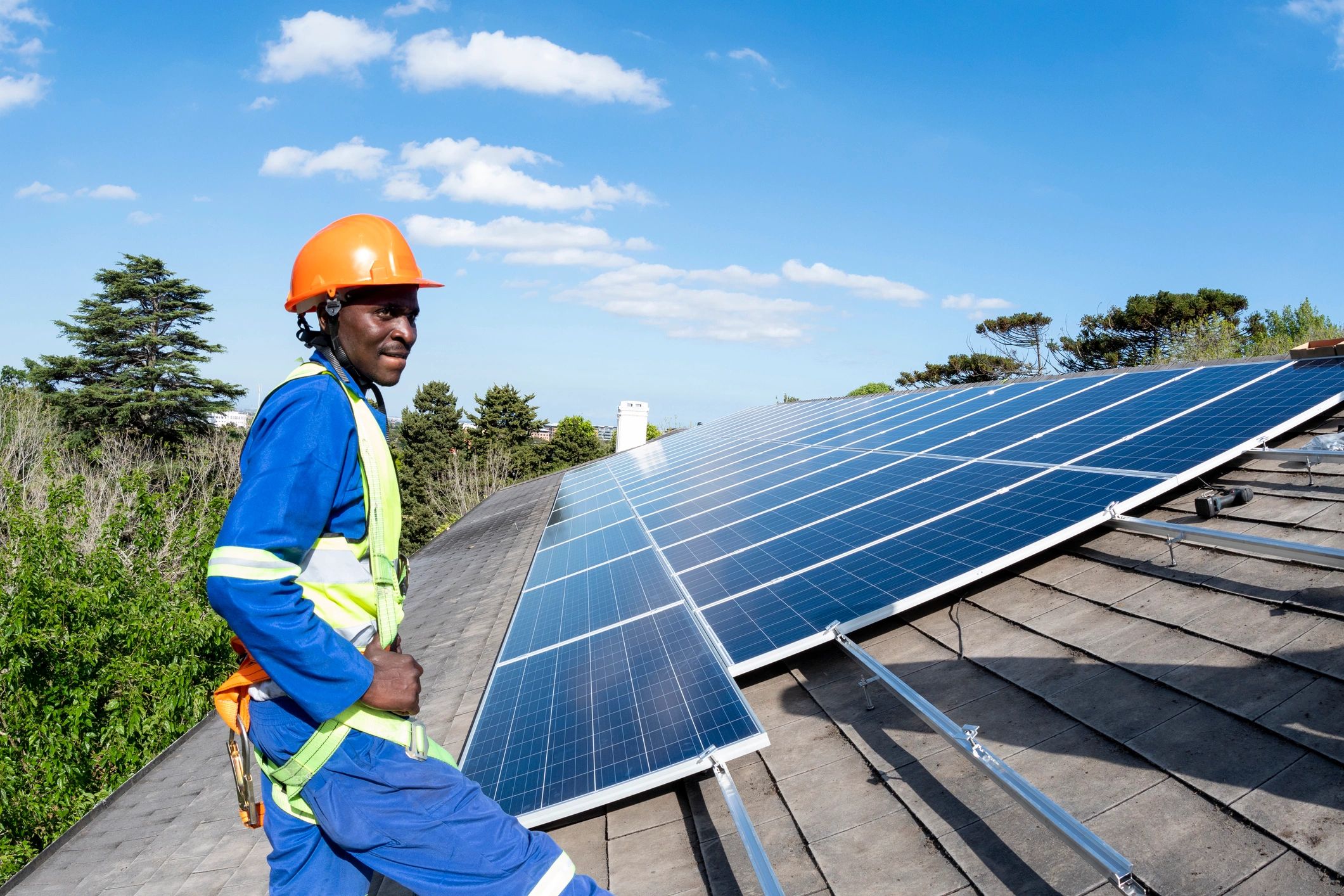 Solar installation worker on a rooftop