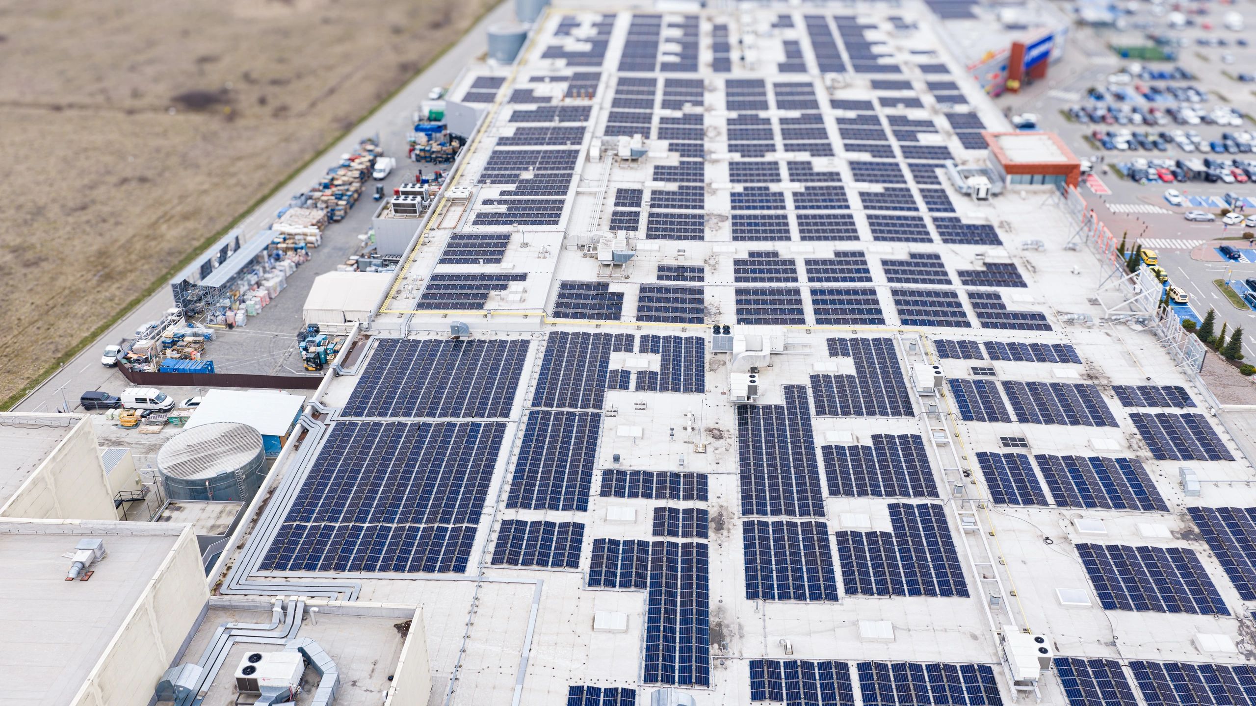 Industrial building rooftop with solar panels